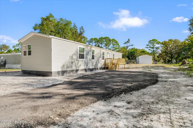 a view of a house with a snow