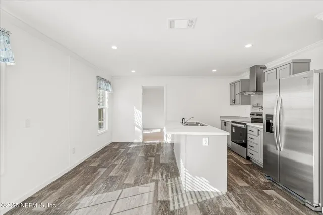 a view of a kitchen with a sink