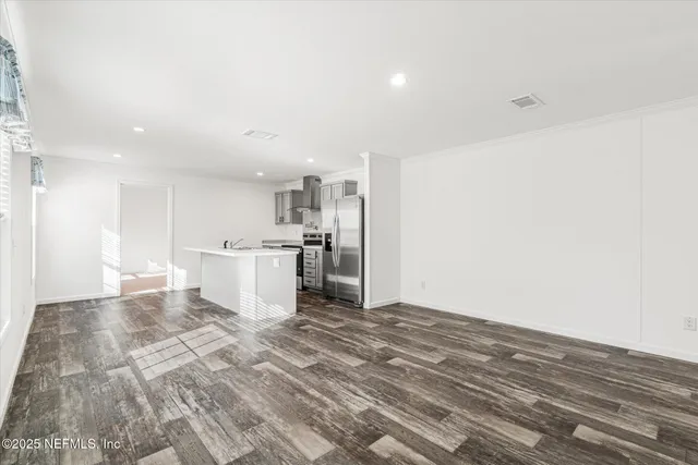 a view of kitchen with wooden floor