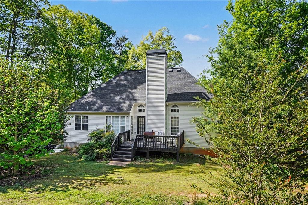 176 Shoreline Way Hampton, GA 30228 - Photo 31 of 32 a house view with a garden space