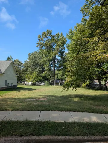 a view of a golf course with a park
