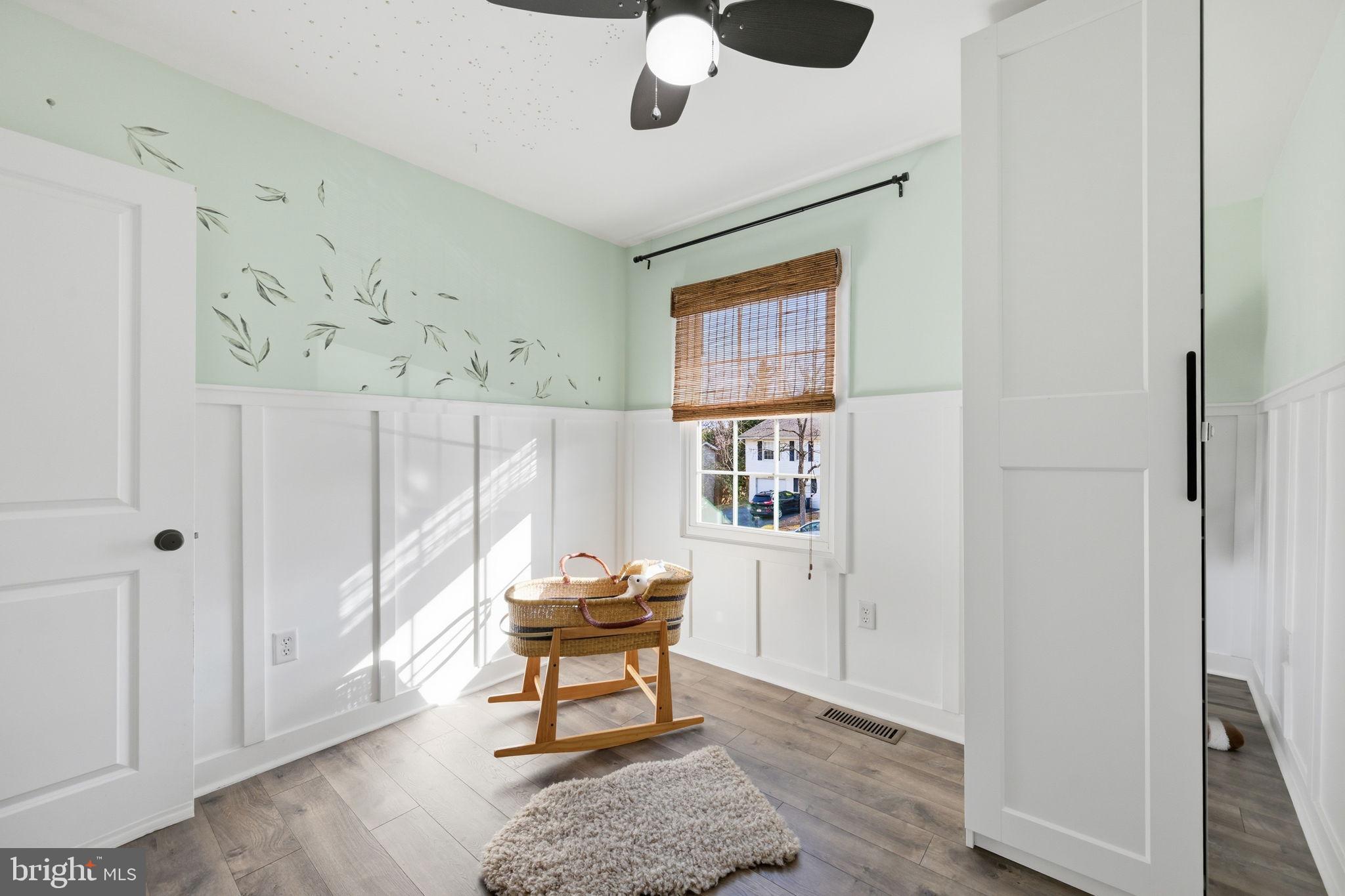 7926 Tower Court Road Severn, MD 21144 - Photo 17 of 32 Wainscoting enhances the room!