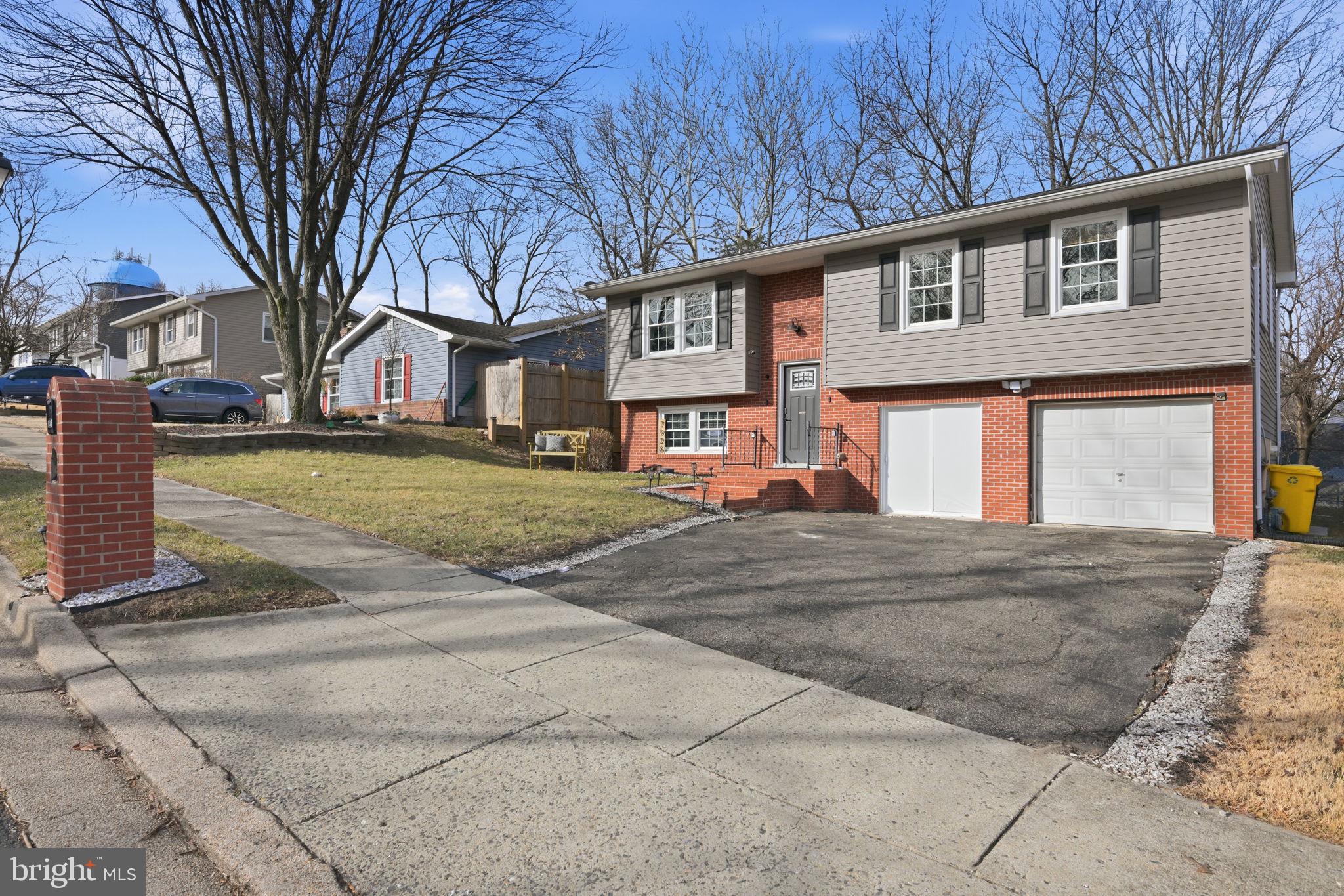 7926 Tower Court Road Severn, MD 21144 - Photo 2 of 32 Large driveway! Plenty of parking!
