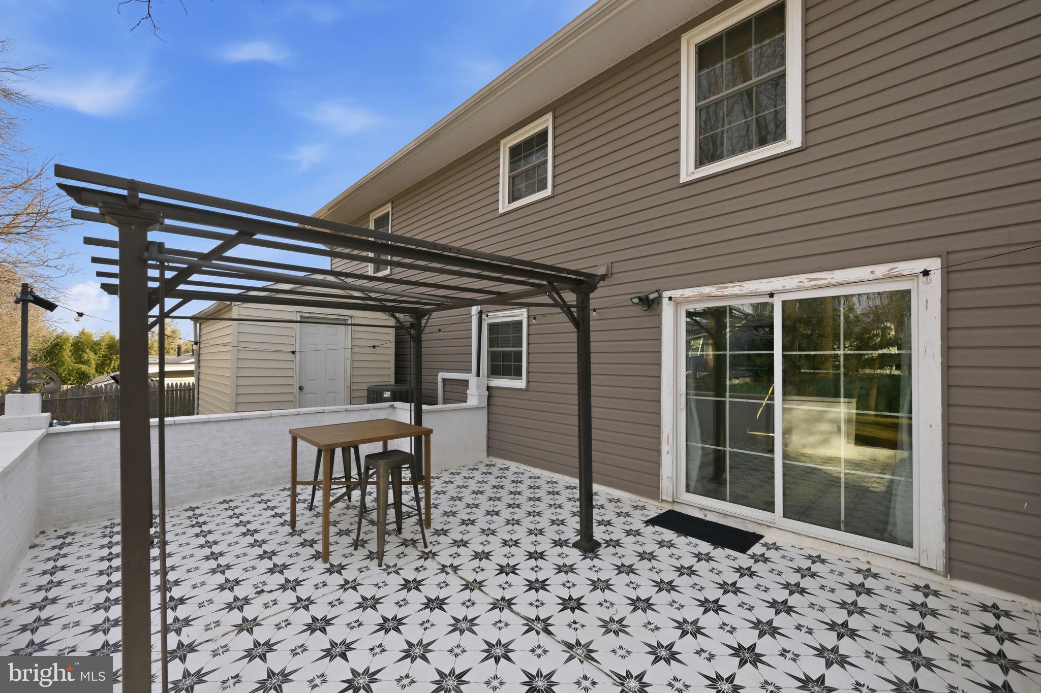 7926 Tower Court Road Severn, MD 21144 - Photo 27 of 32 Patio dreams! Perfect for hosting and enjoying!