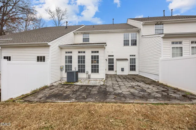 a view of a backyard of the house