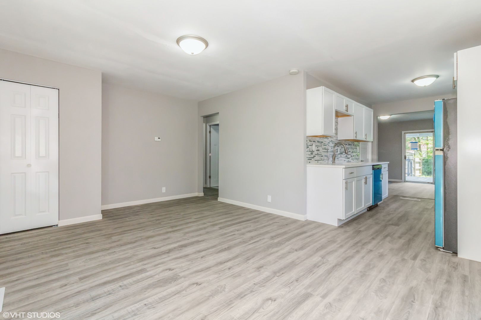 322 South Reed Street Joliet, IL 60436 - Photo 3 of 11 a view of kitchen with wooden floor