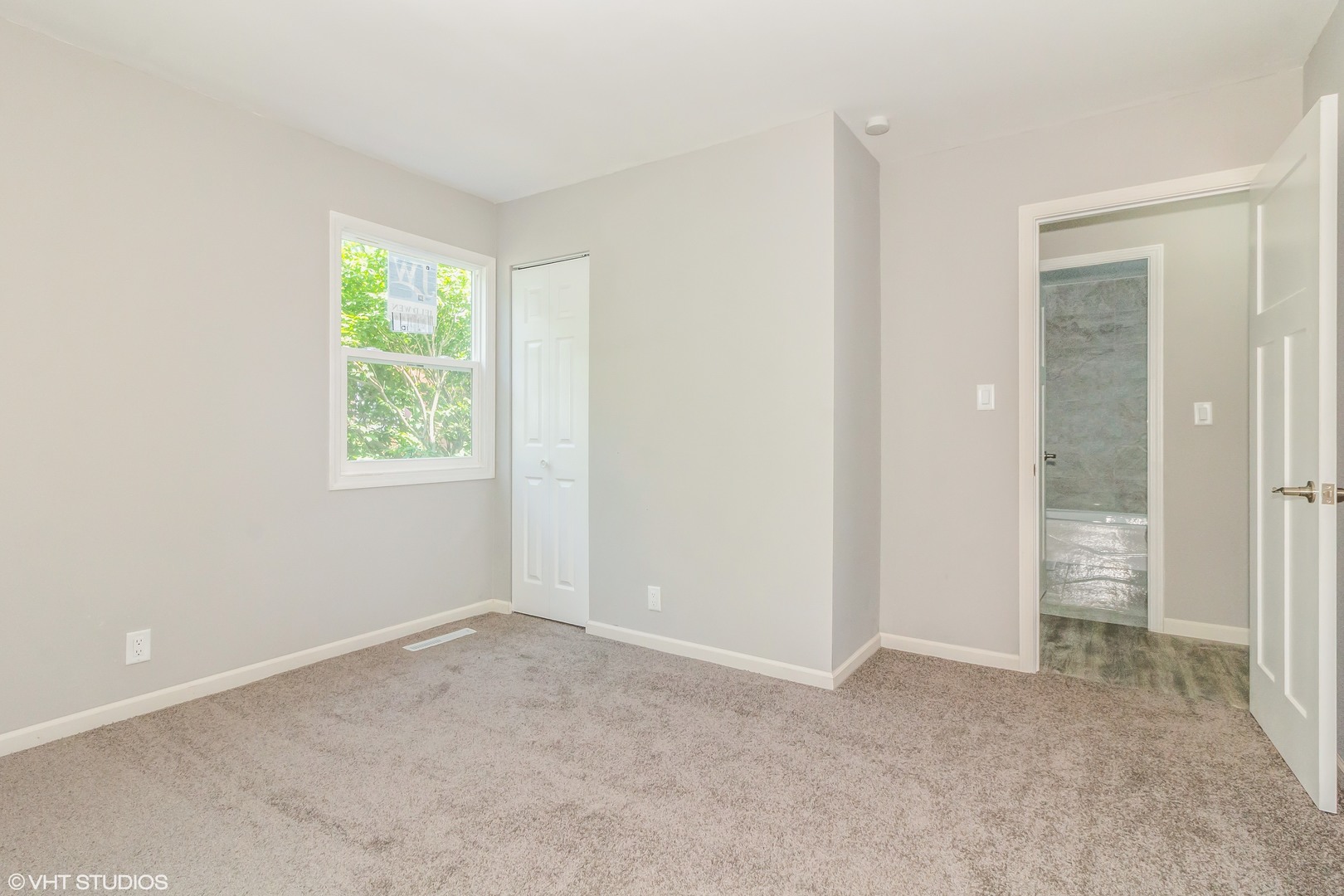322 South Reed Street Joliet, IL 60436 - Photo 7 of 11 an empty room with windows and closet