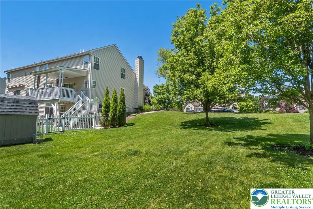 2314 Red Maple Drive Coplay, PA 18037 - Photo 71 of 73 A spacious, verdant yard with mature trees offers a private oasis behind this charming residence.
