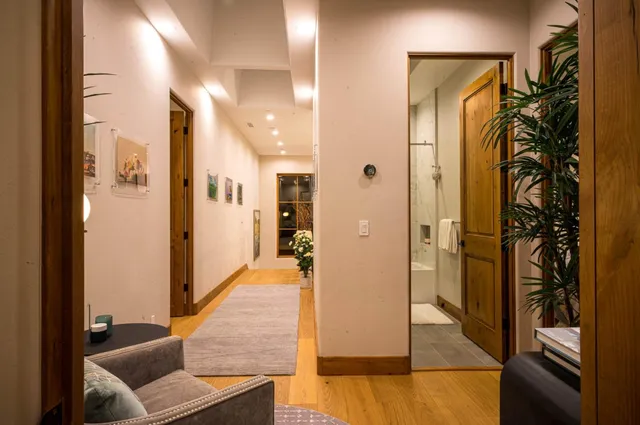 a kitchen with a cabinets and wooden floor