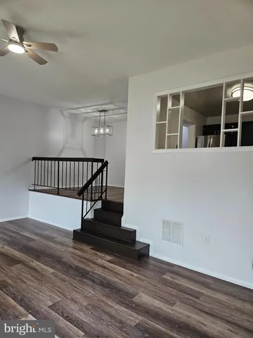 a view of entryway with wooden floor