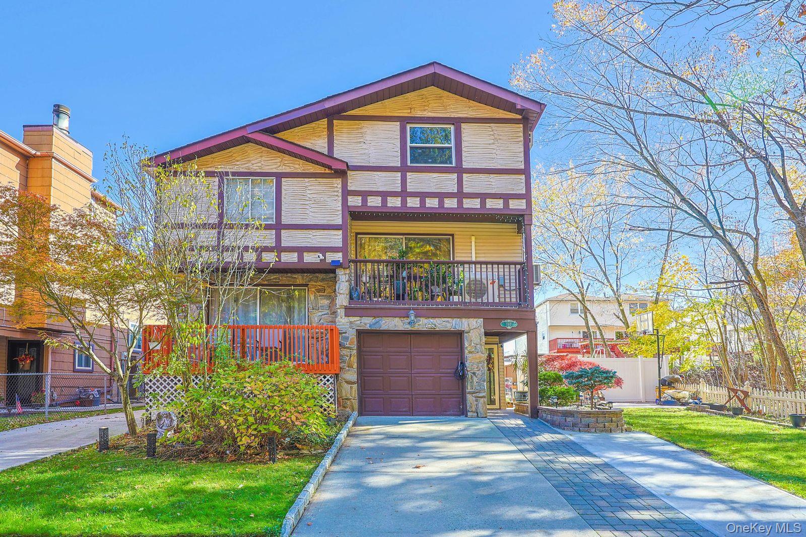 197 Park Drive North Staten Island, NY 10314 - Photo 2 of 37 a front view of house with yard