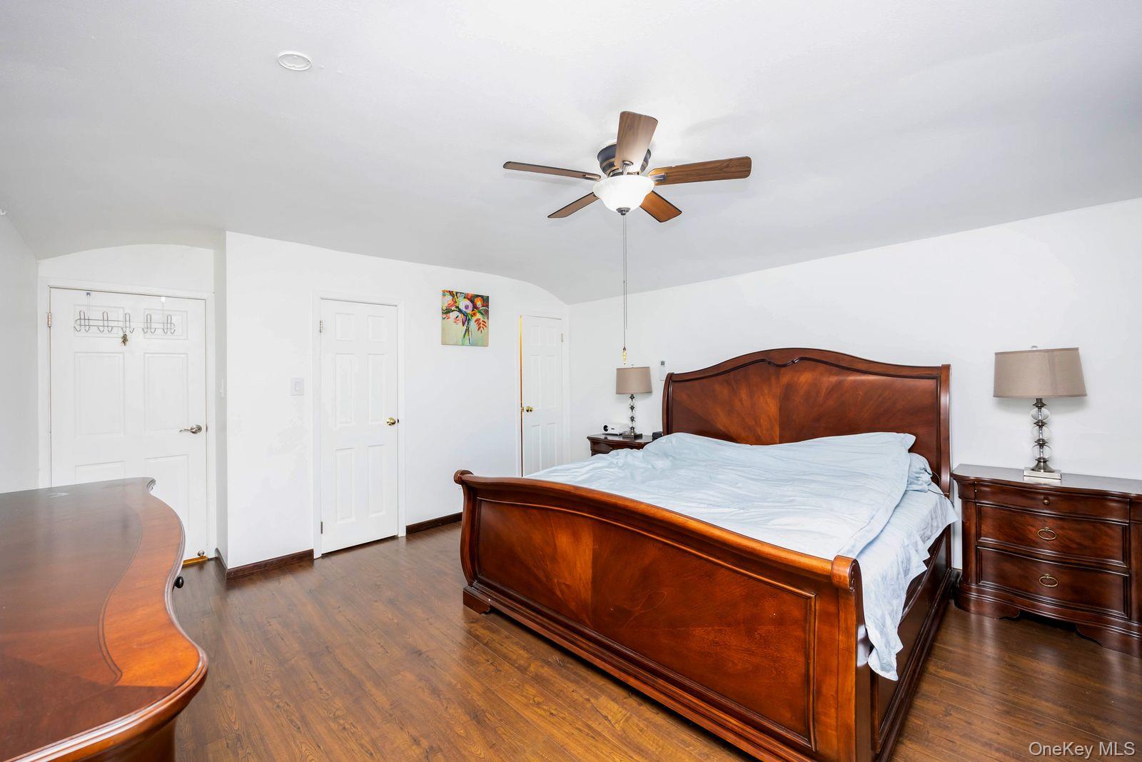 197 Park Drive North Staten Island, NY 10314 - Photo 27 of 37 a room with a bed and a dresser