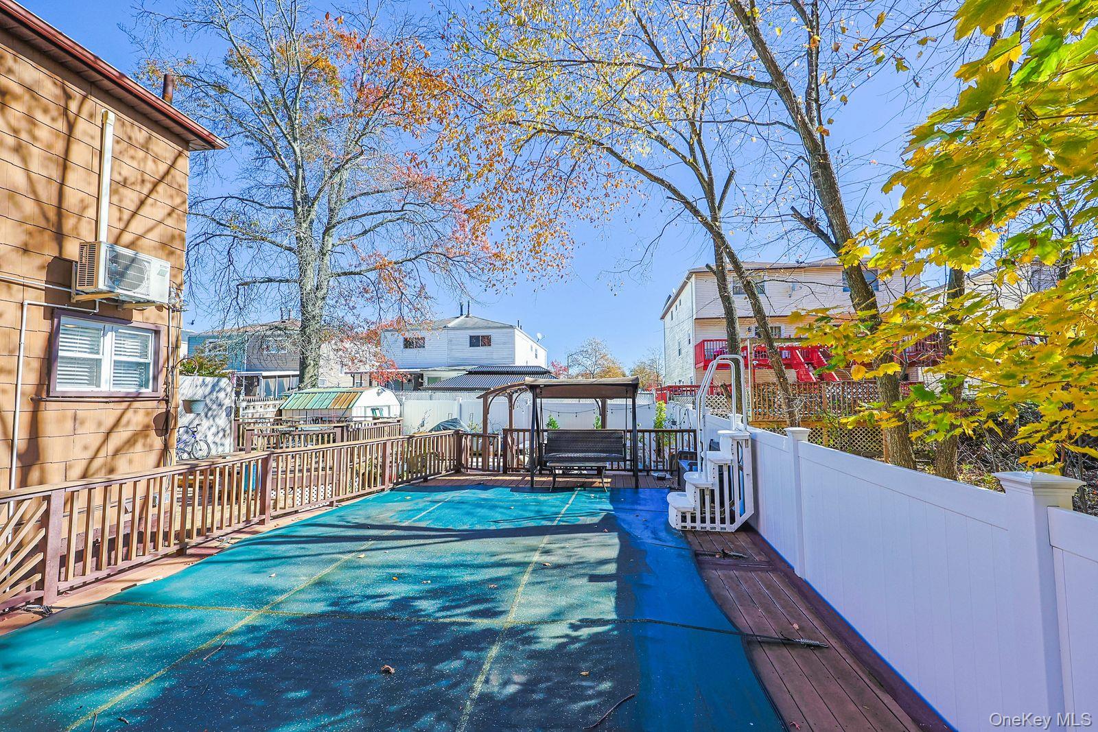 197 Park Drive North Staten Island, NY 10314 - Photo 8 of 37 a view of a house with a yard