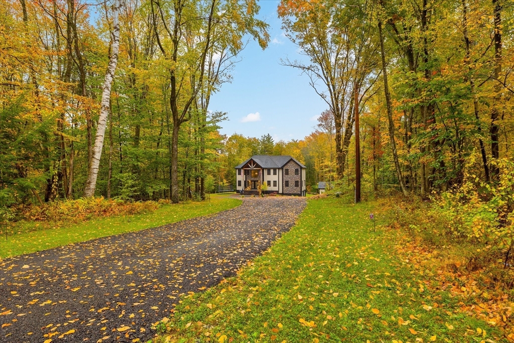 1015 Willis Road Phillipston, MA 01331 - Photo 1 of 42 a view of yard with swimming pool and green space