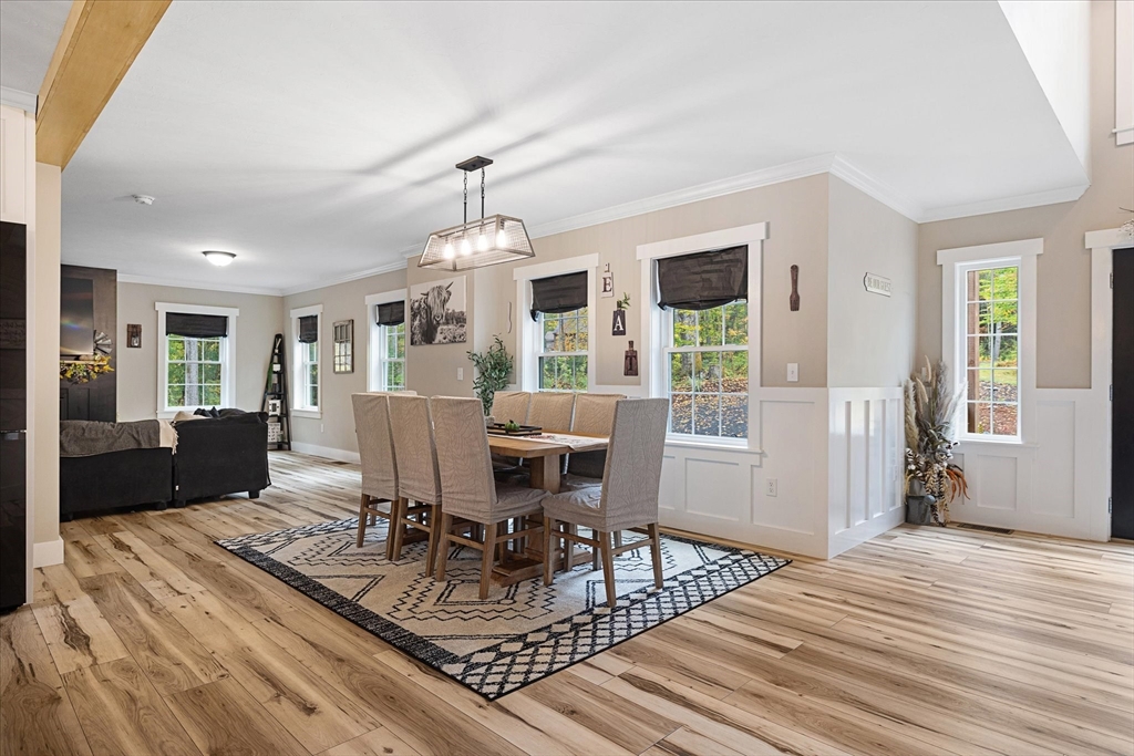 1015 Willis Road Phillipston, MA 01331 - Photo 18 of 42 a view of a livingroom with furniture window and wooden floor