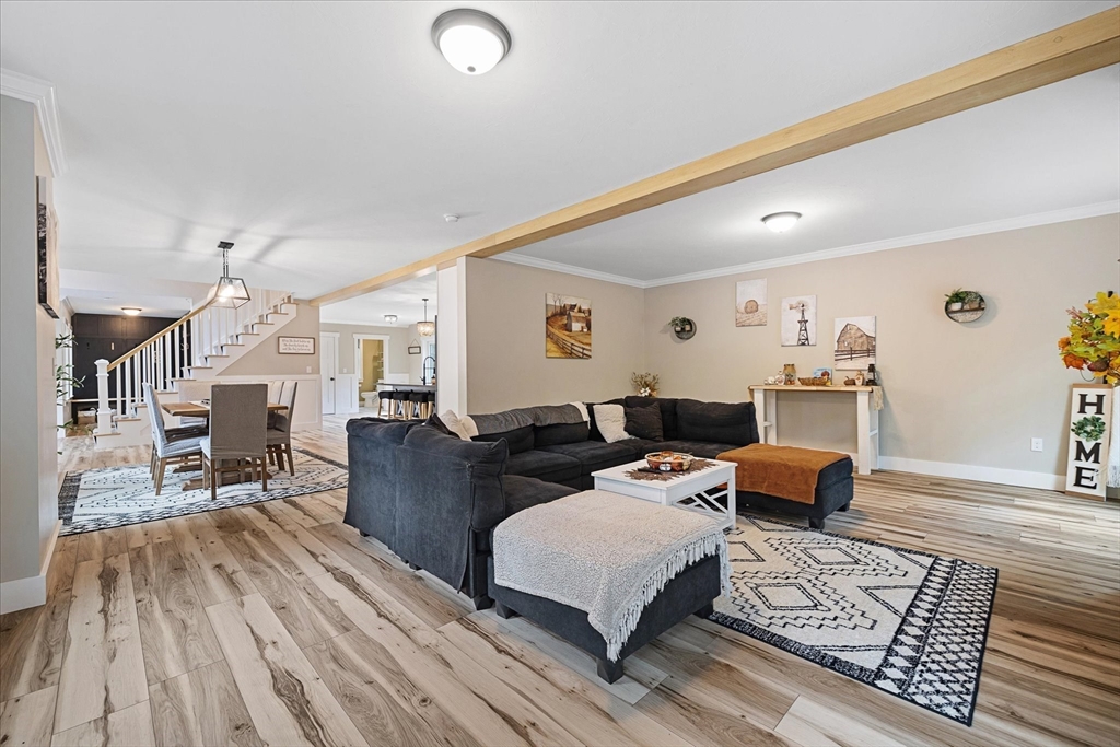 1015 Willis Road Phillipston, MA 01331 - Photo 21 of 42 a living room with furniture and a wooden floor