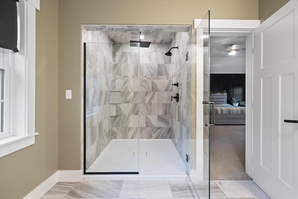 1015 Willis Road Phillipston, MA 01331 - Photo 26 of 42 a bathroom with a shower and a tub