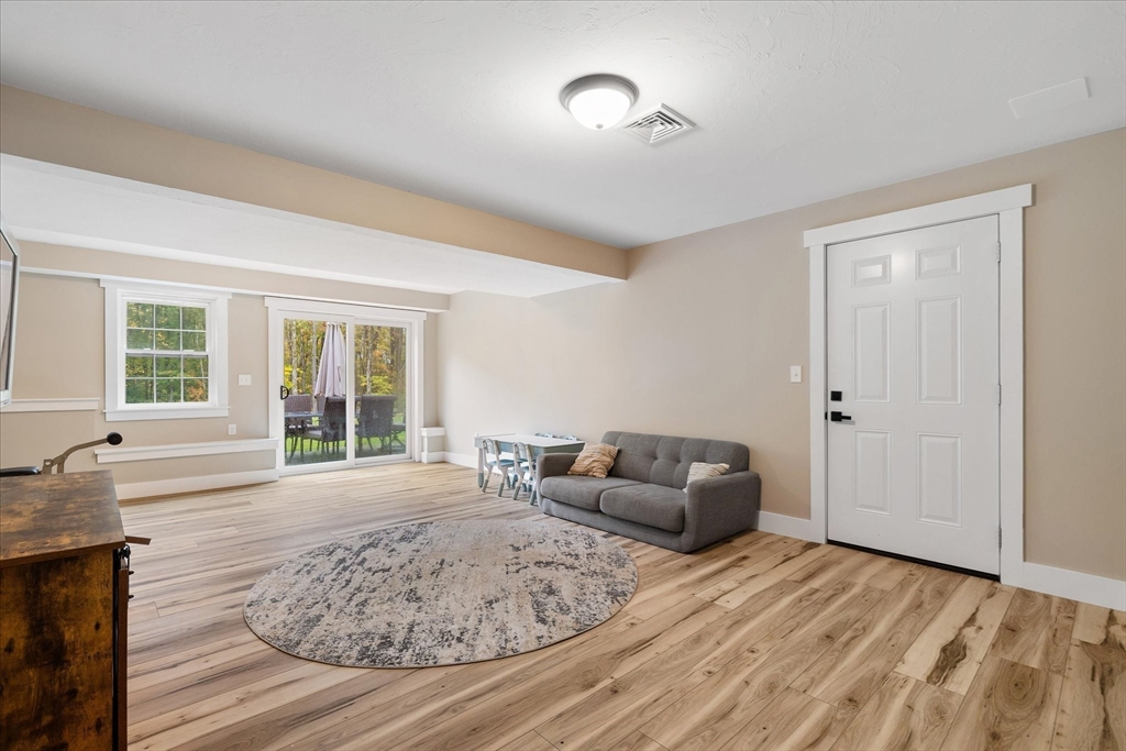 1015 Willis Road Phillipston, MA 01331 - Photo 35 of 42 a living room with furniture and windows