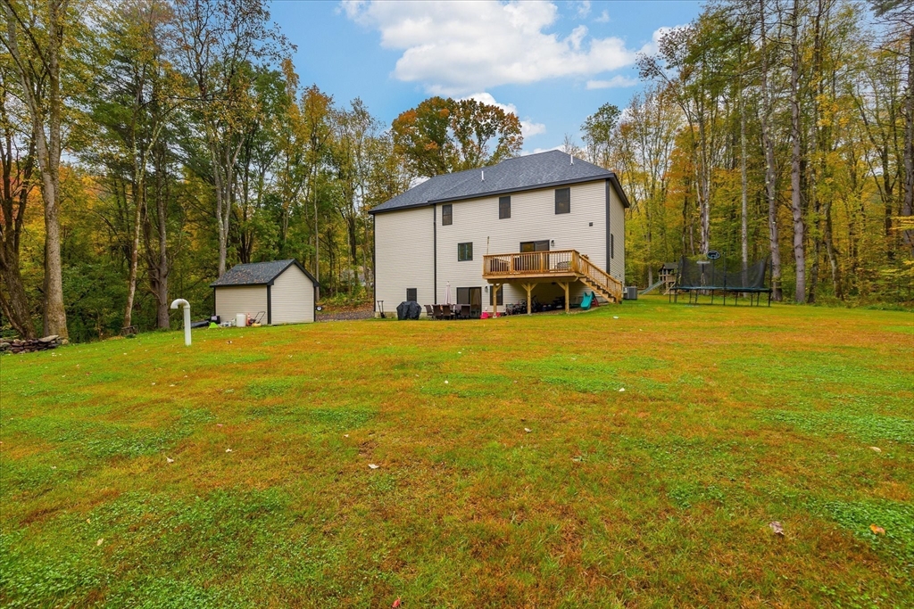 1015 Willis Road Phillipston, MA 01331 - Photo 41 of 42 a view of a house with a yard