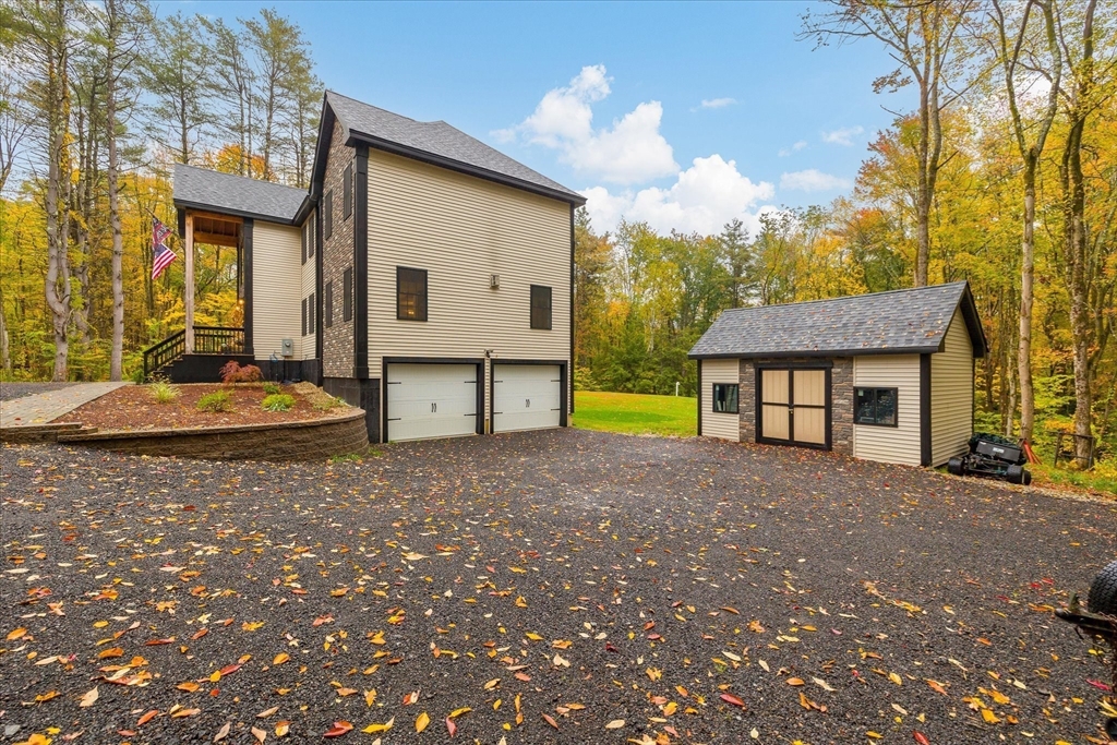 1015 Willis Road Phillipston, MA 01331 - Photo 5 of 42 a view of a house with backyard and a tree