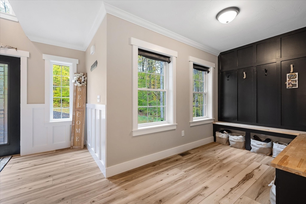 1015 Willis Road Phillipston, MA 01331 - Photo 9 of 42 a view of a room with wooden floor and windows
