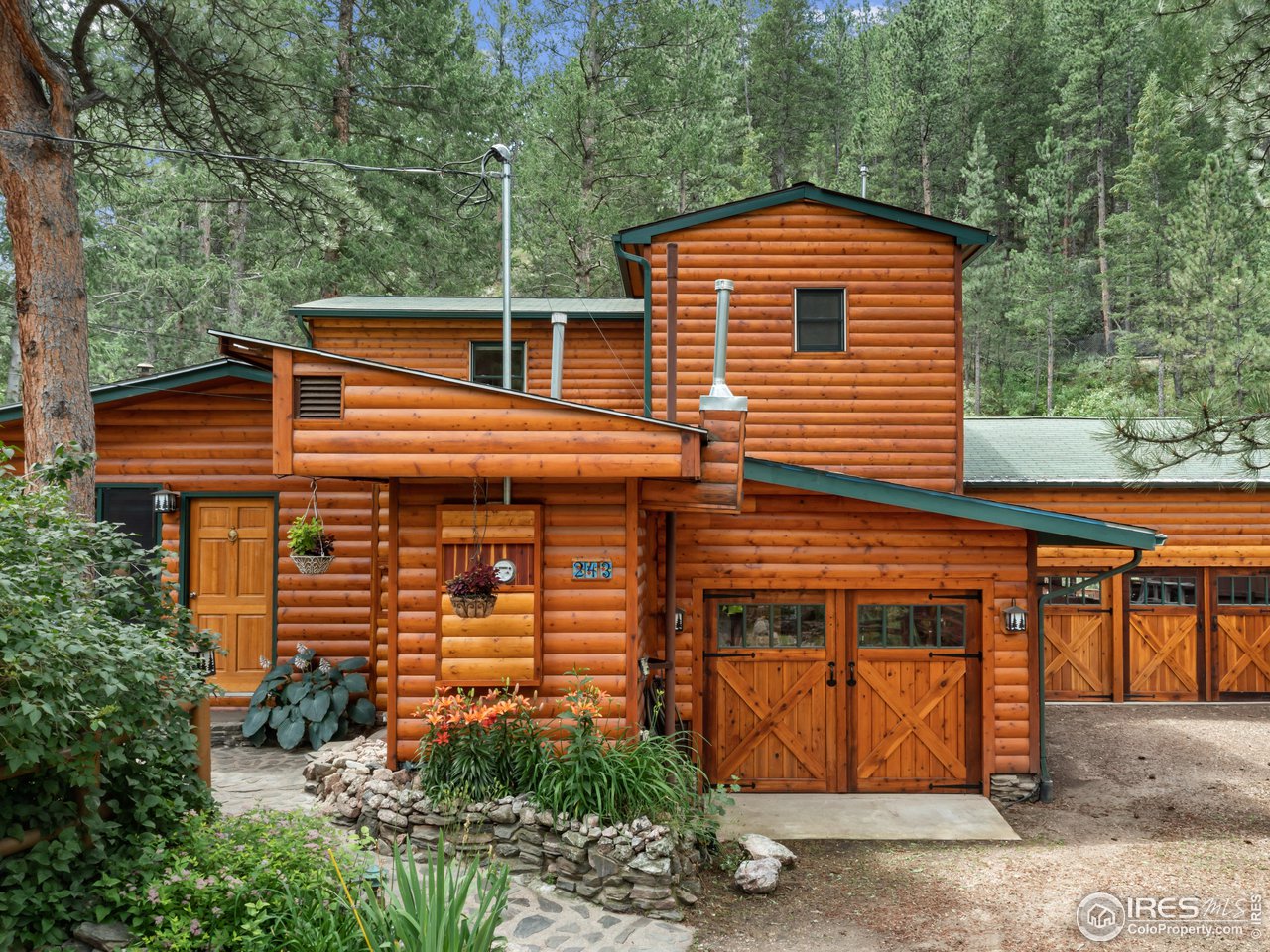 a front view of a house with a garage