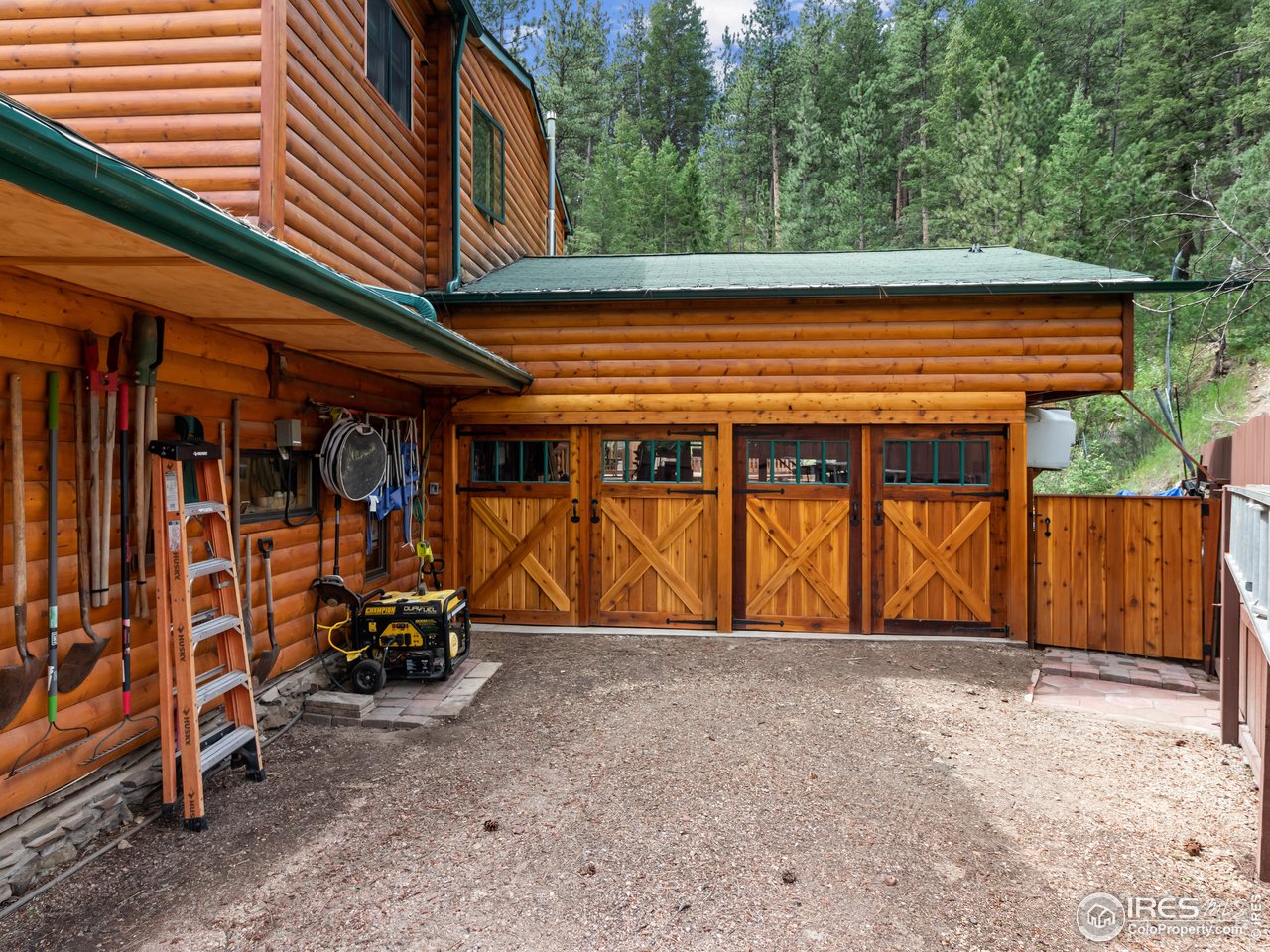 243 Waltonia Road Drake, CO 80515 - Photo 24 of 38 a view of outdoor space and front view of a house