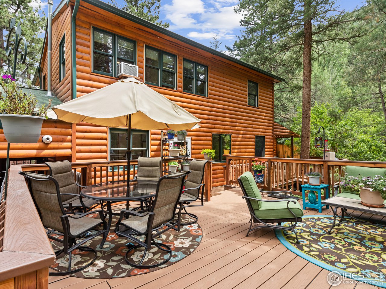 243 Waltonia Road Drake, CO 80515 - Photo 29 of 38 a view of a patio with couple of chairs