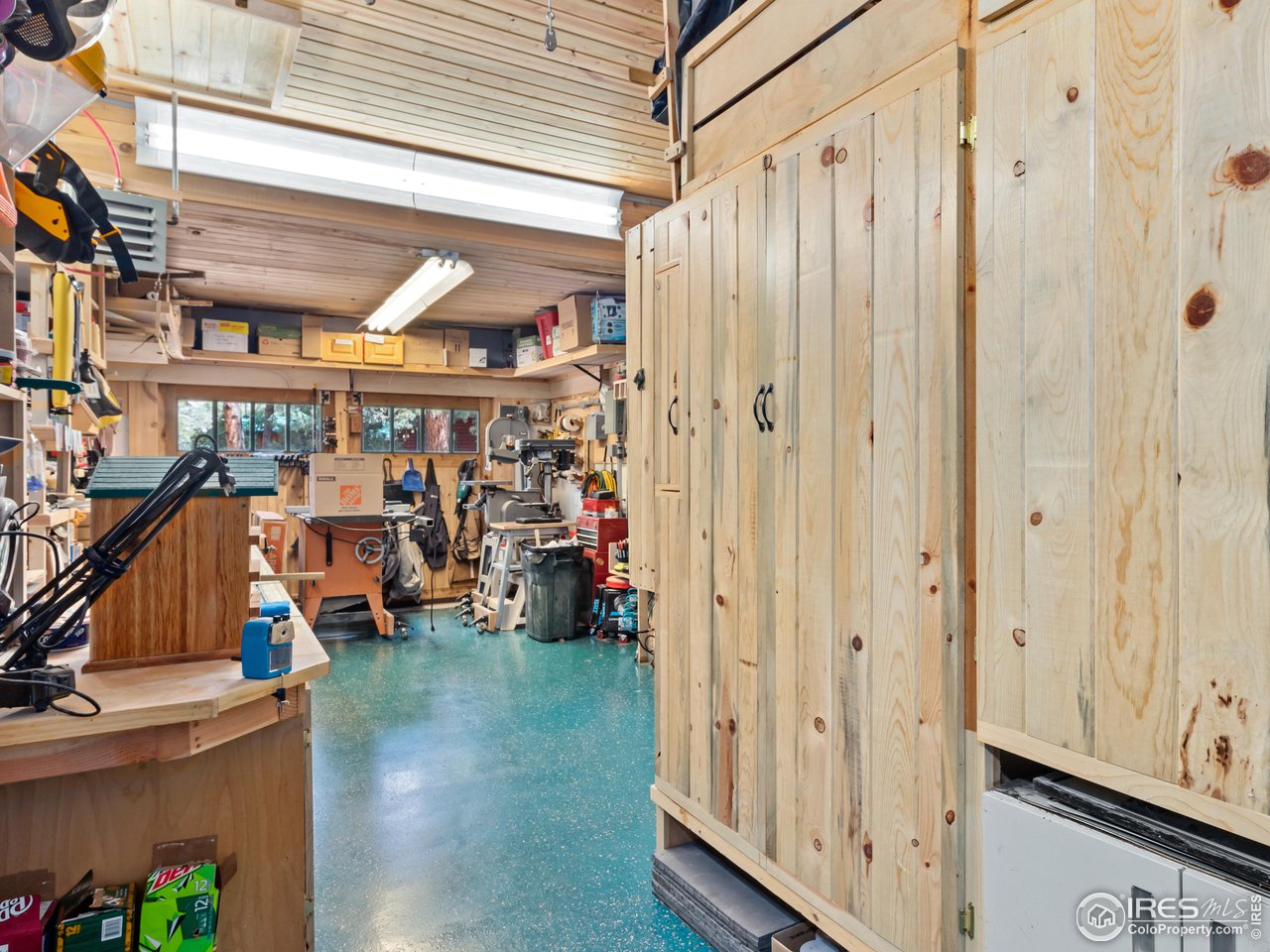243 Waltonia Road Drake, CO 80515 - Photo 35 of 38 a view of a room with lots of wooden furniture