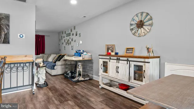 a bedroom with furniture and a fireplace