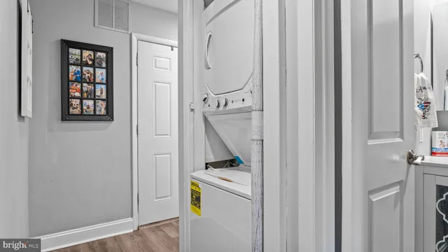 a room that has a window and a table in it