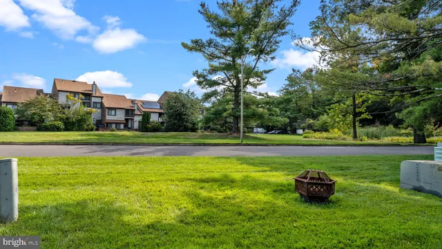 a view of a garden and basketball court