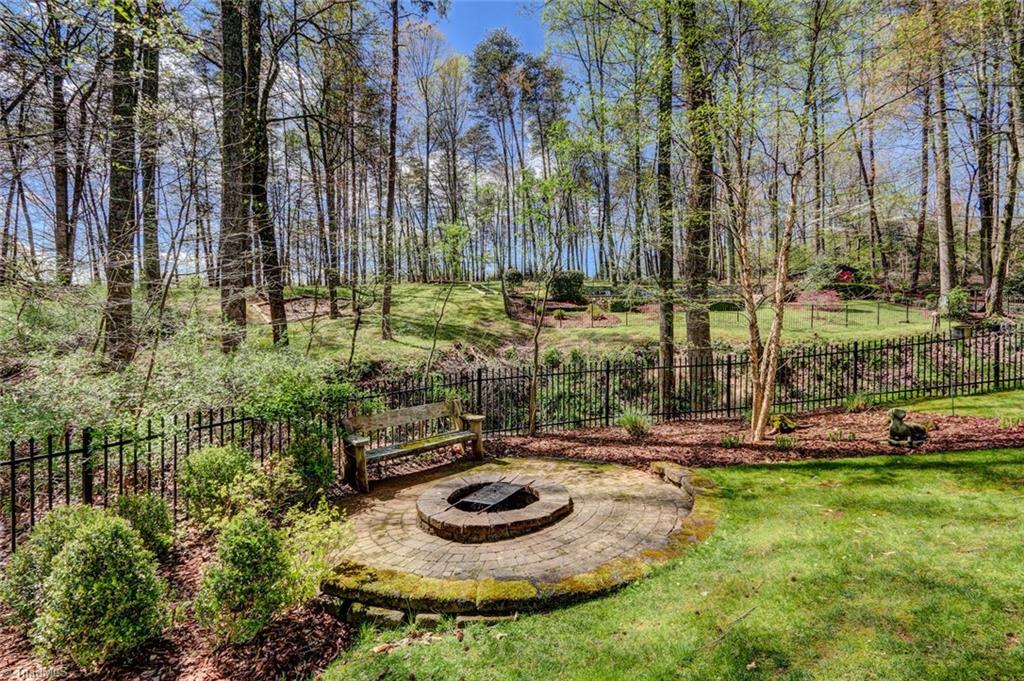 5809 Henson Farm Road Summerfield, NC 27358 - Photo 21 of 29 The must-have fire pit! Gather around with friends and family for an evening of marshmallows and s'mores!