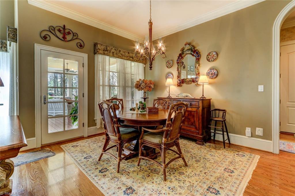 5809 Henson Farm Road Summerfield, NC 27358 - Photo 8 of 29 Informal dinging area off the kitchen and great is both bright and cheery. Entertain in uncrowded comfort!