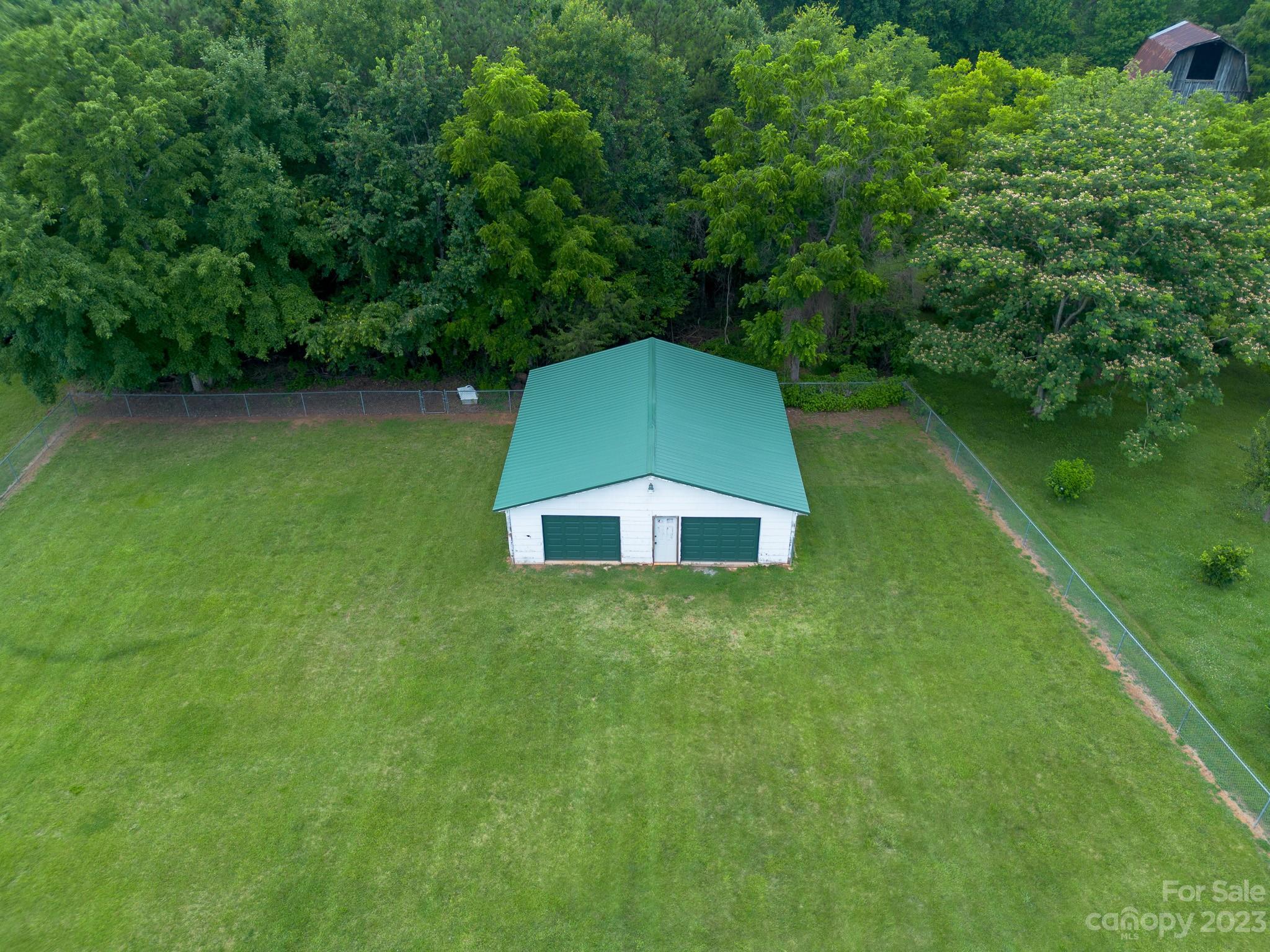146 Sorrells Road Rutherfordton, NC 28139 - Photo 15 of 25 a backyard of a house with lots of green space