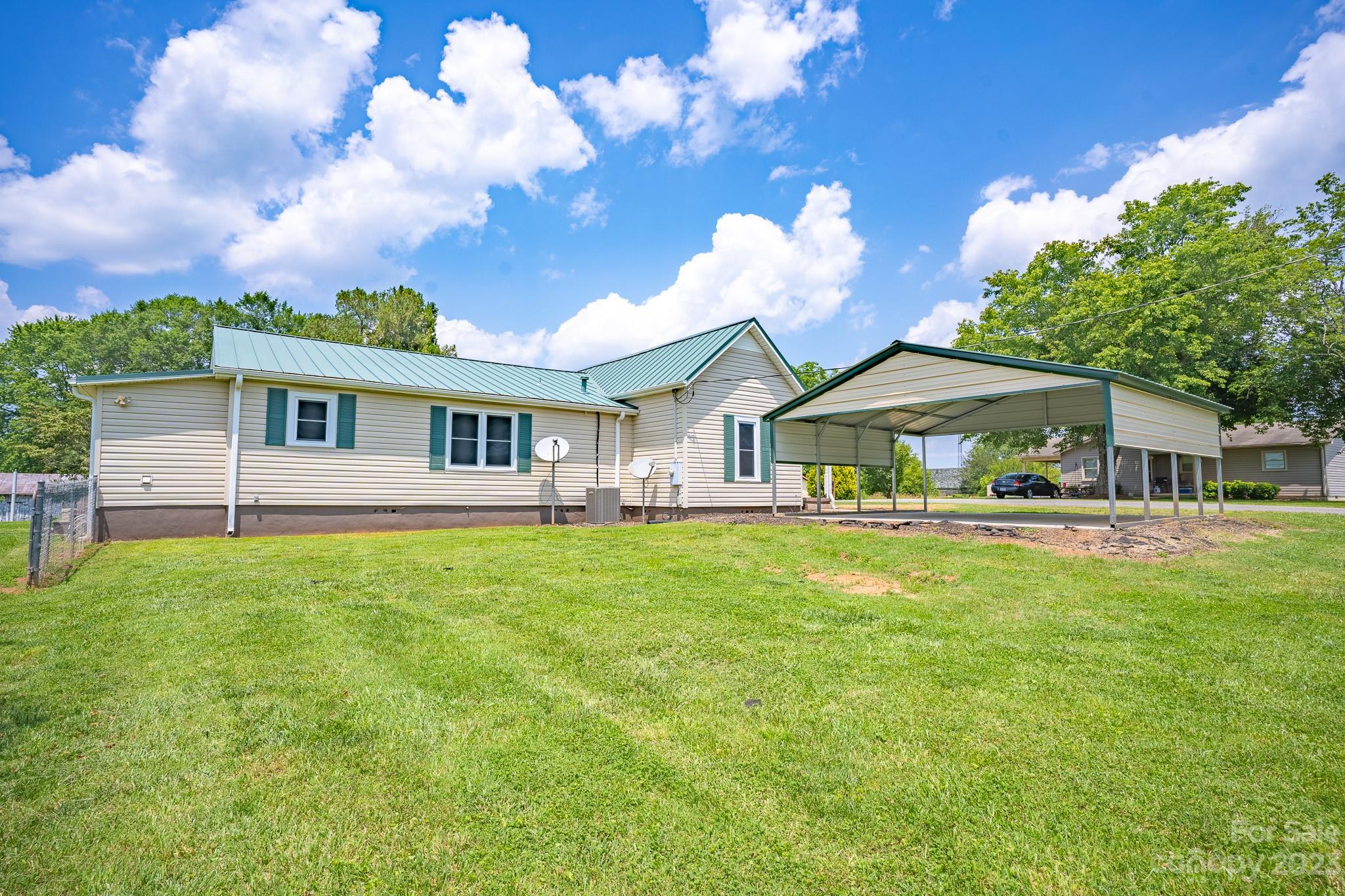146 Sorrells Road Rutherfordton, NC 28139 - Photo 17 of 25 a front view of a house with a garden