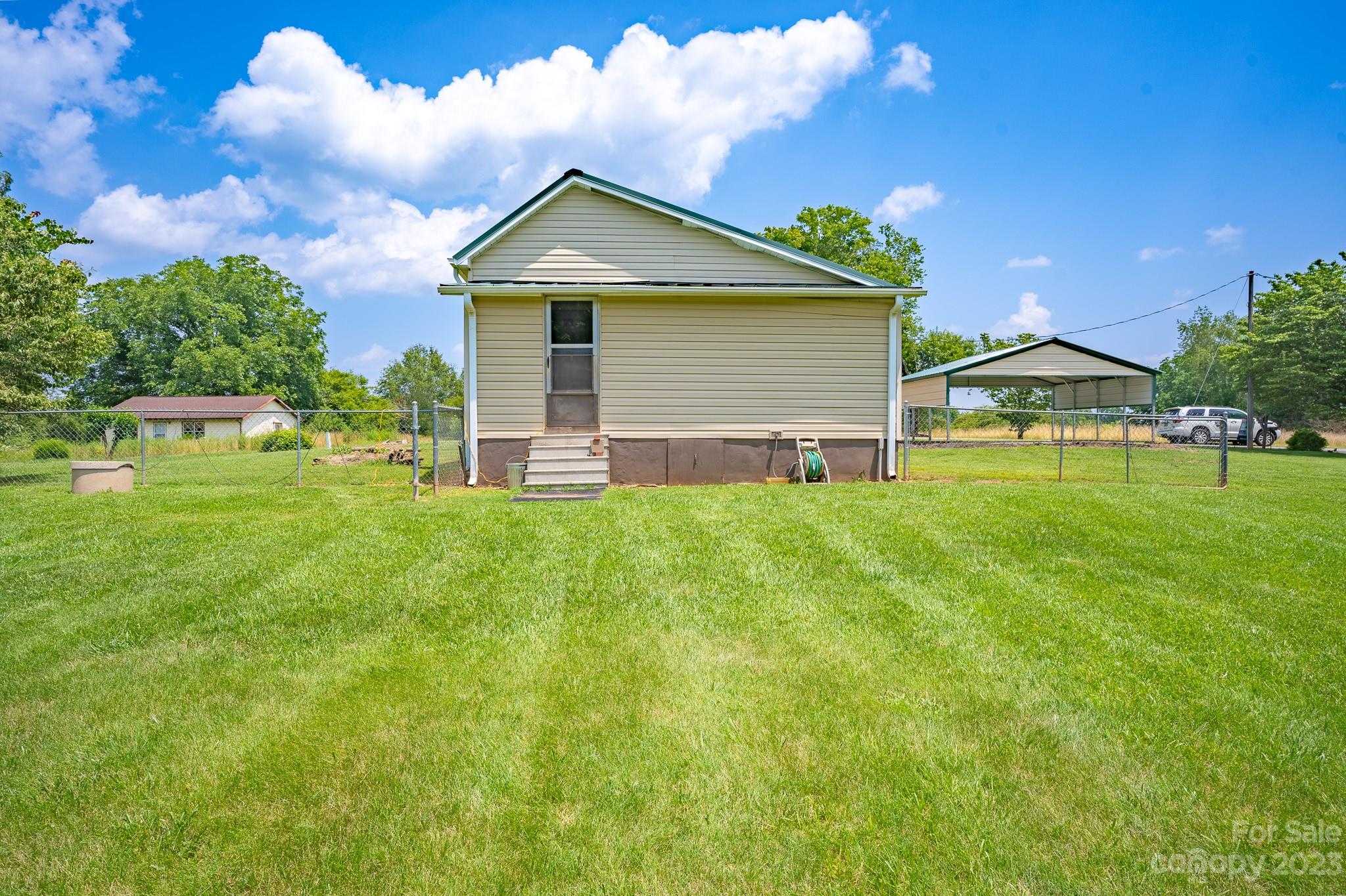 146 Sorrells Road Rutherfordton, NC 28139 - Photo 19 of 25 a front view of a house with a yard
