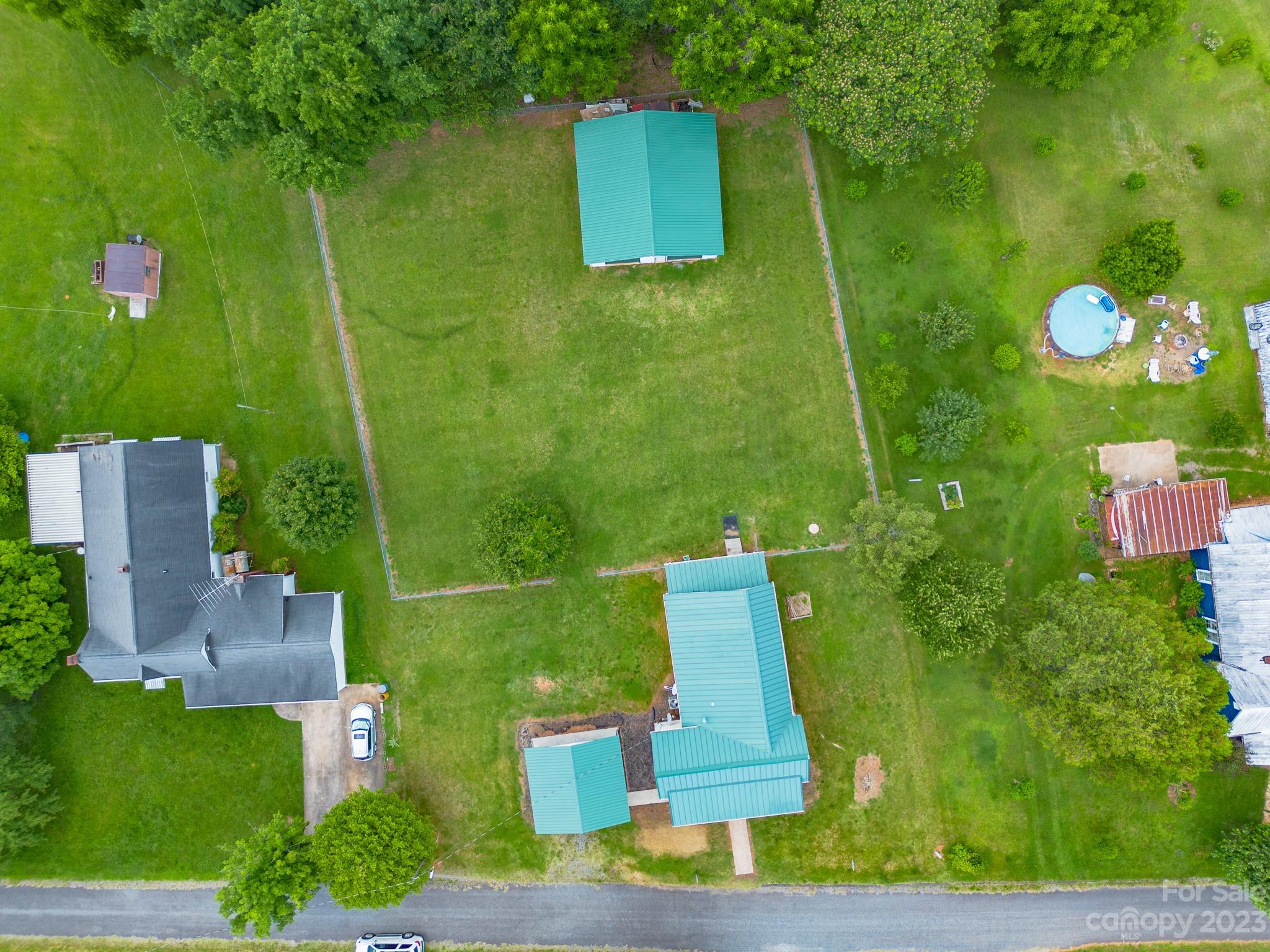 146 Sorrells Road Rutherfordton, NC 28139 - Photo 22 of 25 an aerial view of a house with a yard