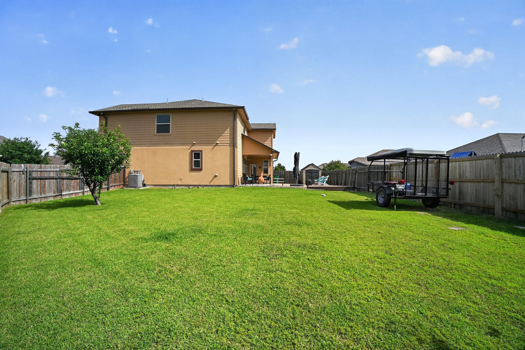 16816 Ruggio Road Pflugerville, TX 78660 - Photo 28 of 30 Large side yard and lots of back patio space for entertaining
