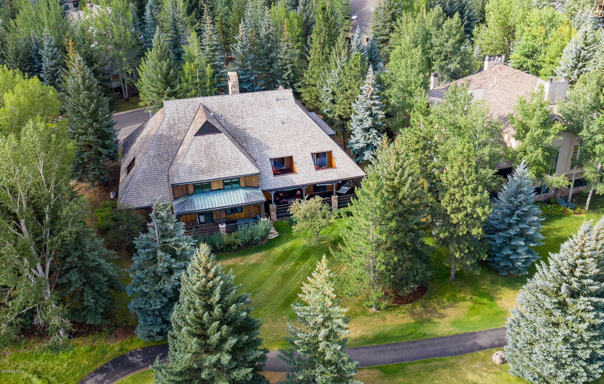 10 Bachelor Gulch Road Beaver Creek, CO 81620 - Photo 17 of 19 an aerial view of a house with yard and green space