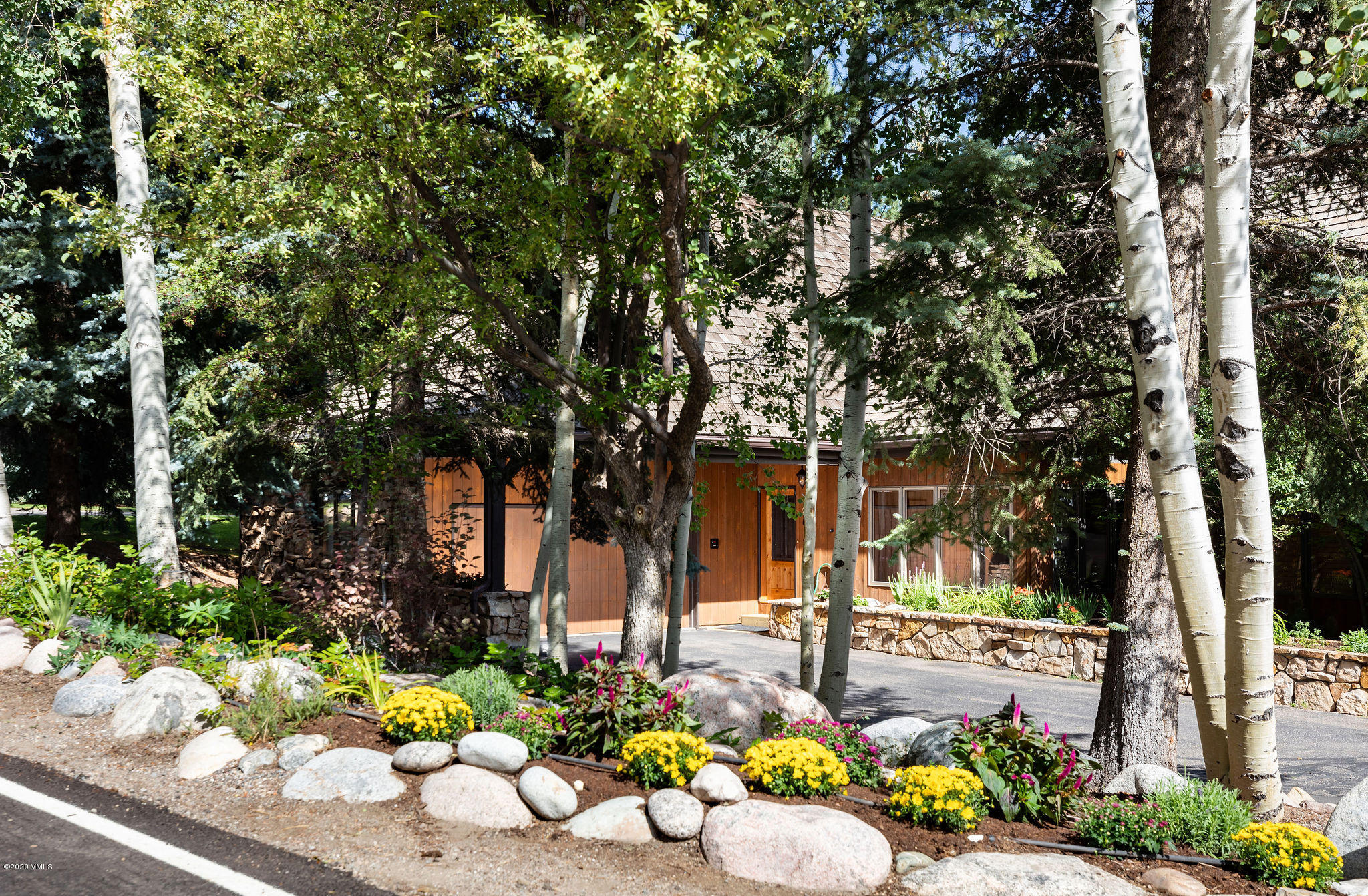 10 Bachelor Gulch Road Beaver Creek, CO 81620 - Photo 3 of 19 a view of a street with large trees