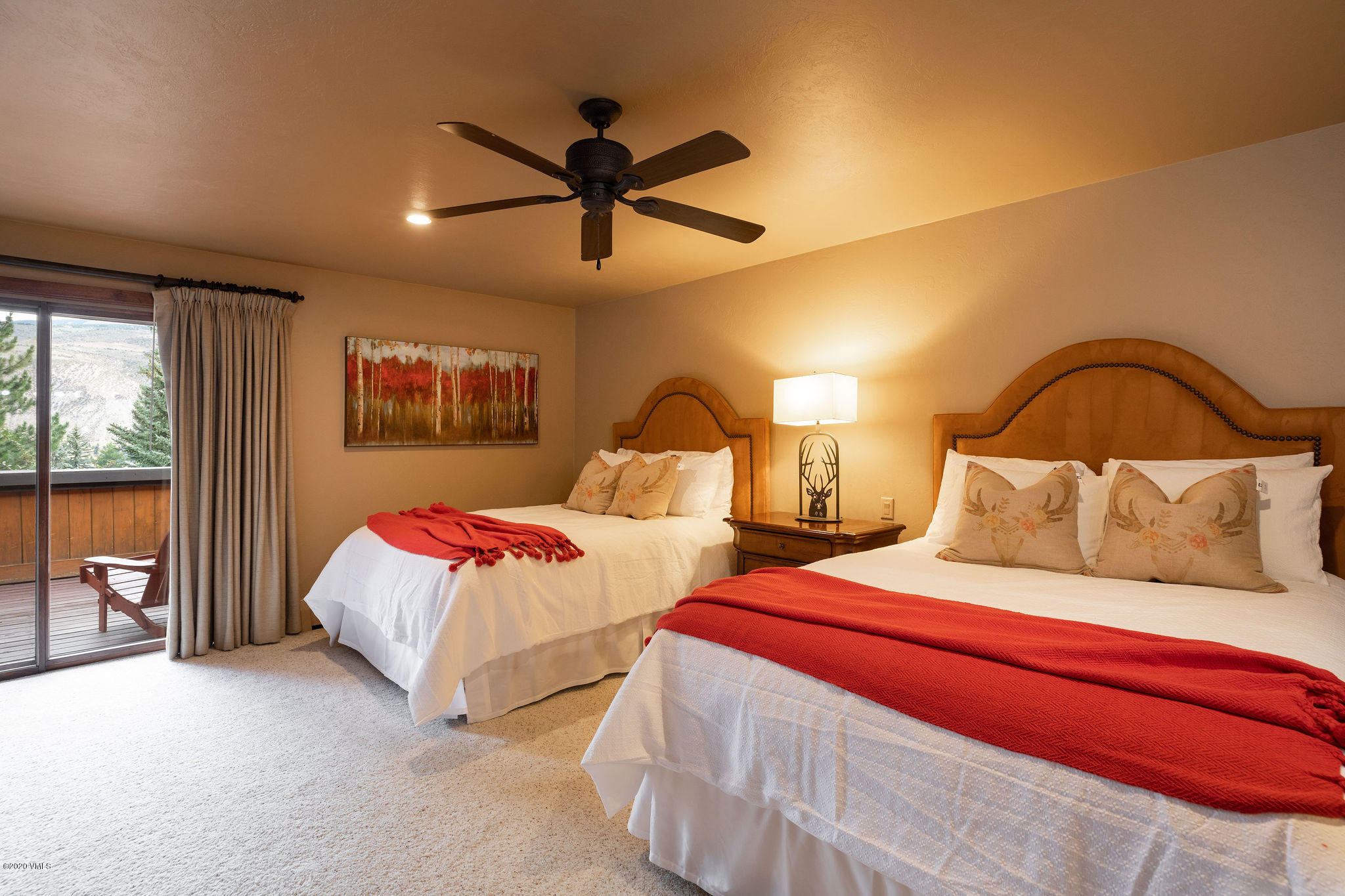 10 Bachelor Gulch Road Beaver Creek, CO 81620 - Photo 7 of 19 a bedroom with two beds and ceiling fan