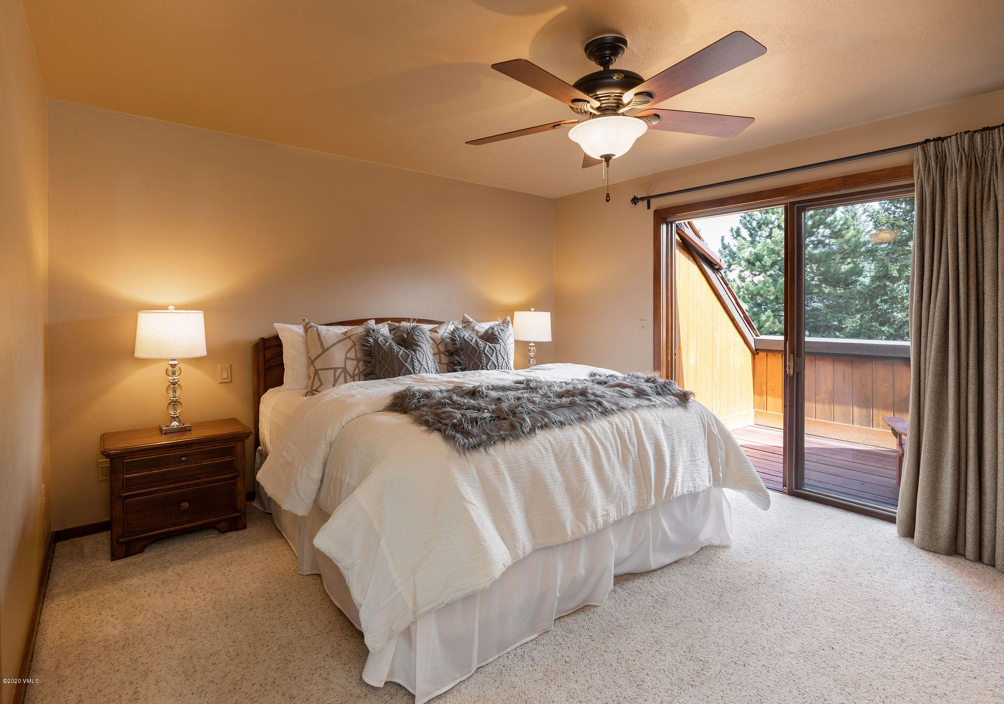 10 Bachelor Gulch Road Beaver Creek, CO 81620 - Photo 9 of 19 a spacious bedroom with a bed and a large window