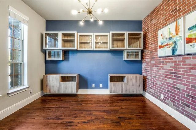 a view of a livingroom with furniture and window