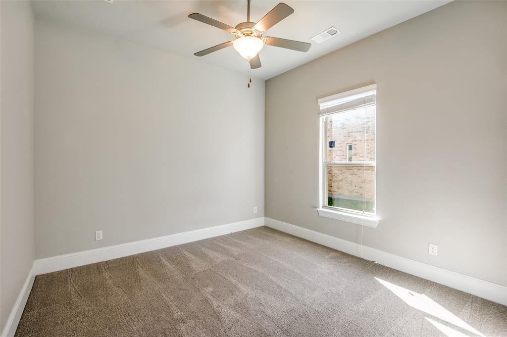 11409 La Salle Road Frisco, TX 75035 - Photo 16 of 23 an empty room with a window and a fan