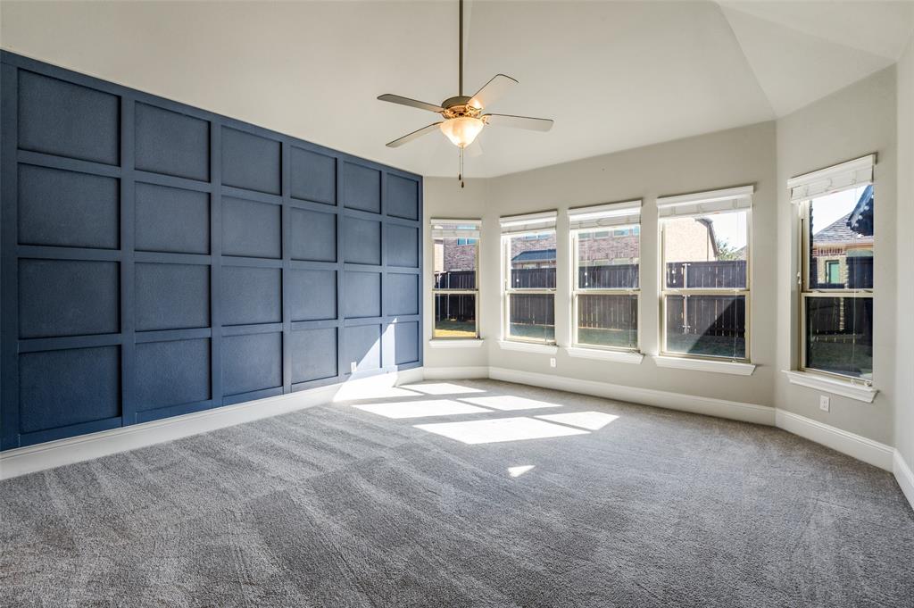 11409 La Salle Road Frisco, TX 75035 - Photo 9 of 23 a view of a livingroom with a ceiling fan and window