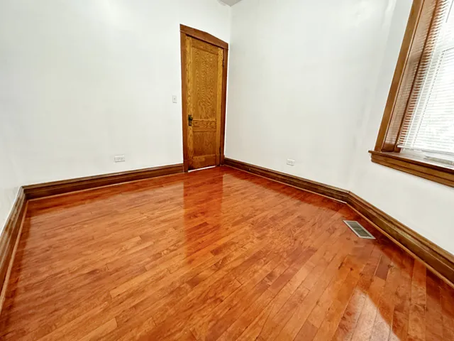 a room with a black white checkered floor and a black white checkered floor