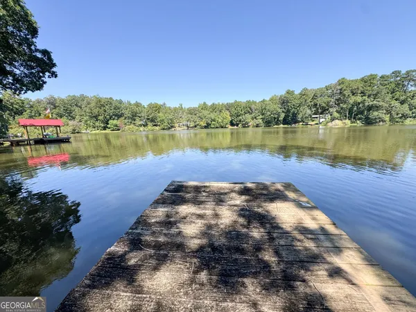 a view of a swimming pool and an outdoor space