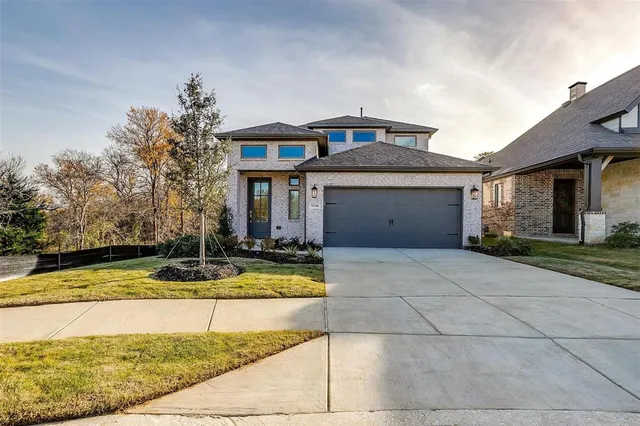 a front view of a house with swimming pool