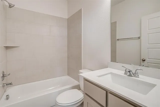 an empty room with windows and entrance